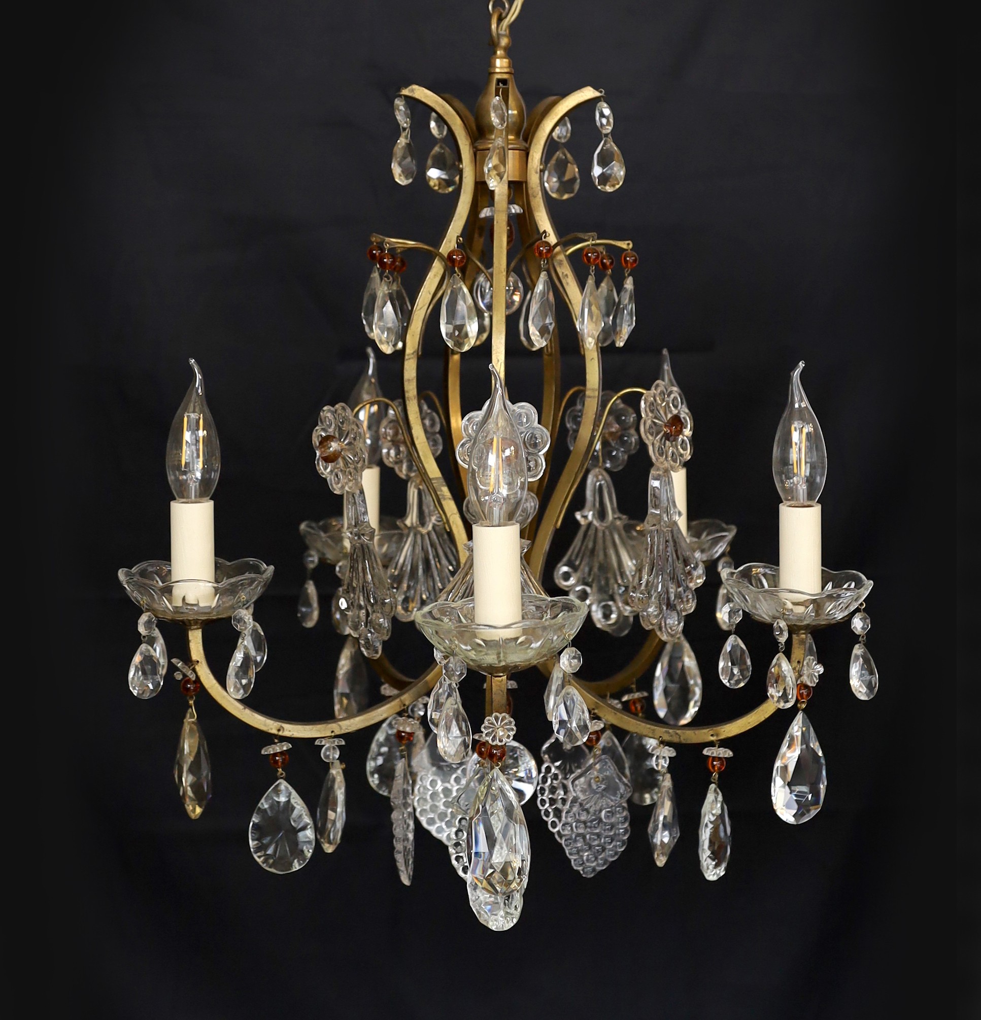 An early 20th century French bronzed metal and glass drop five light chandelier, height 63cm. width 48cm